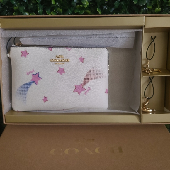 Coach Handbags - Coach Corner Zip Wristlet with Disco Star Print Boxed